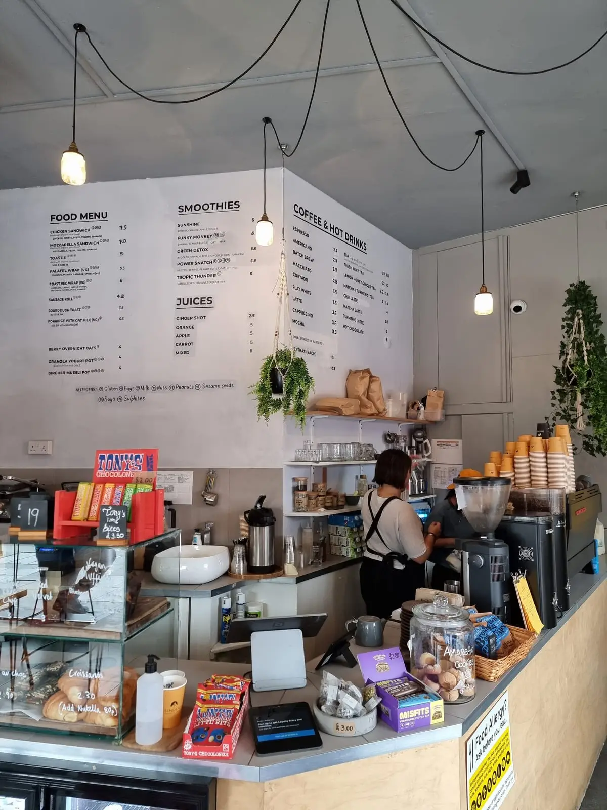 The counter and menu boards at Sendero Specialty Coffee